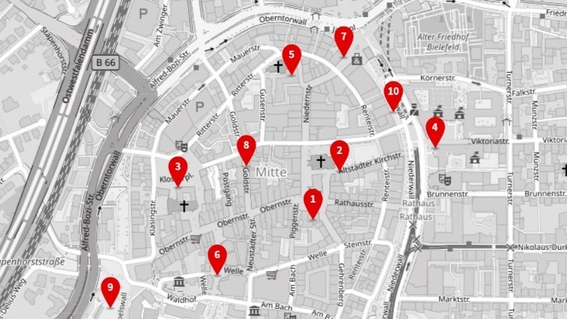 Stadtplan der Bielefelder Innenstadt mit Straßen, Gebäuden und zehn nummerierten roten Markierungen