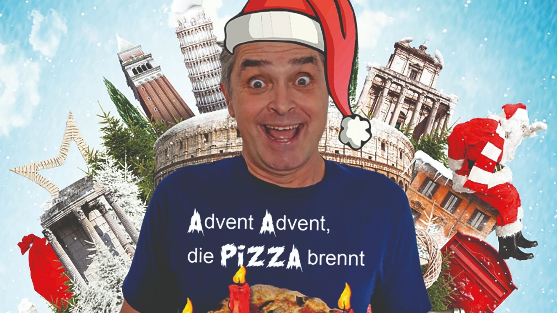 Roberto Capitoni lachend mit Weihnachtsmütze und T-Shirt "Advent Advent, die Pizza brennt", umgeben von italienischen