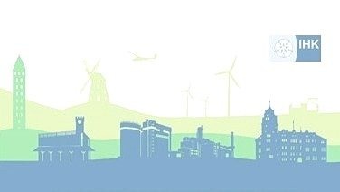 Silhouette einer Landschaft mit Schloss, Denkmalturm, Windmühle, Windrädern, Flugzeug, verschiedenen Gebäuden und